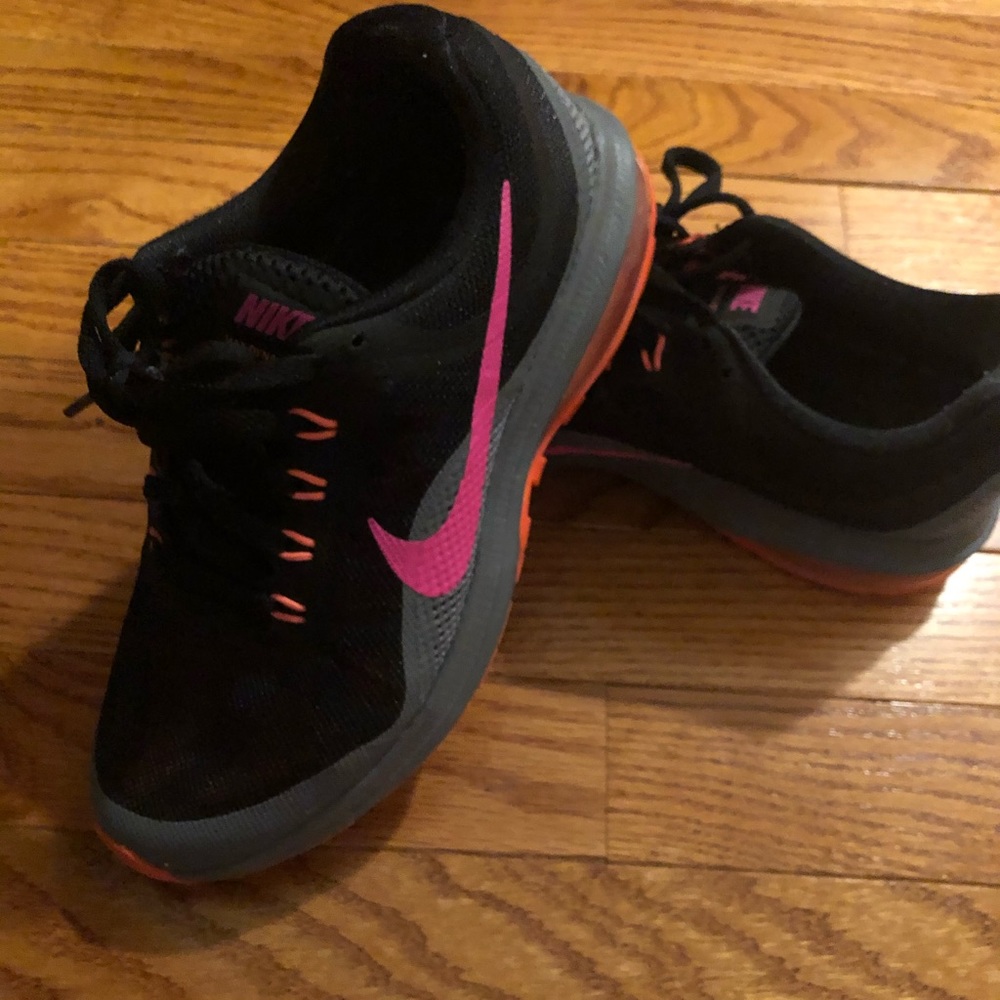 Lightly used Nike black and pink sneakers